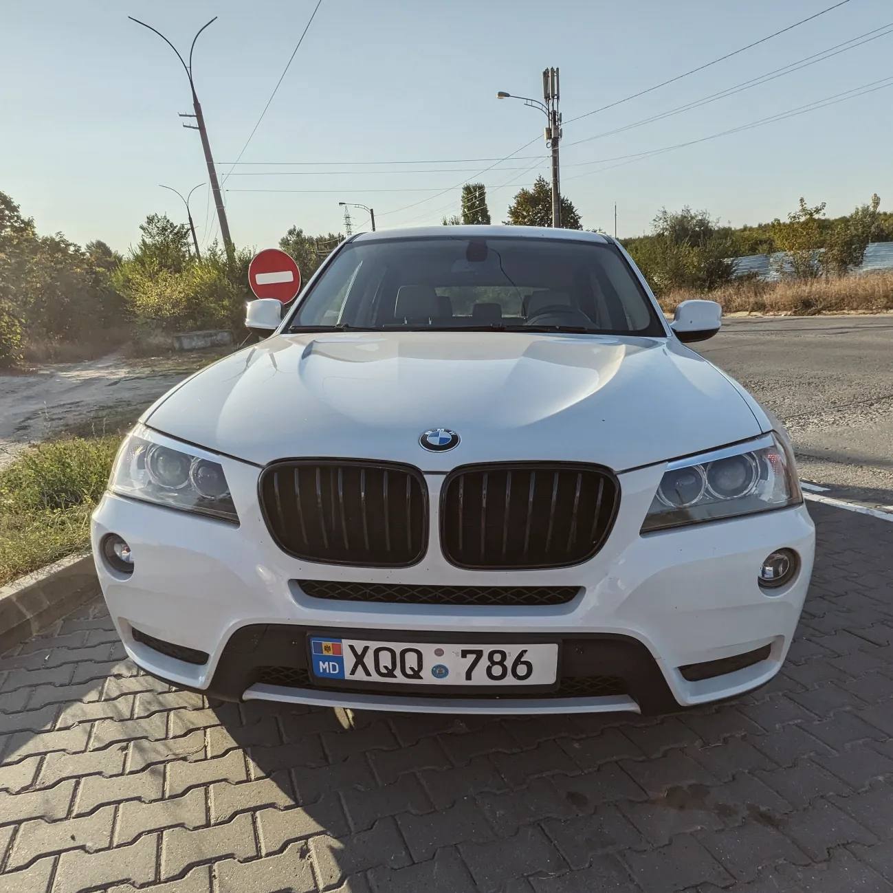 X3 from the front, on the road, with the black grilles