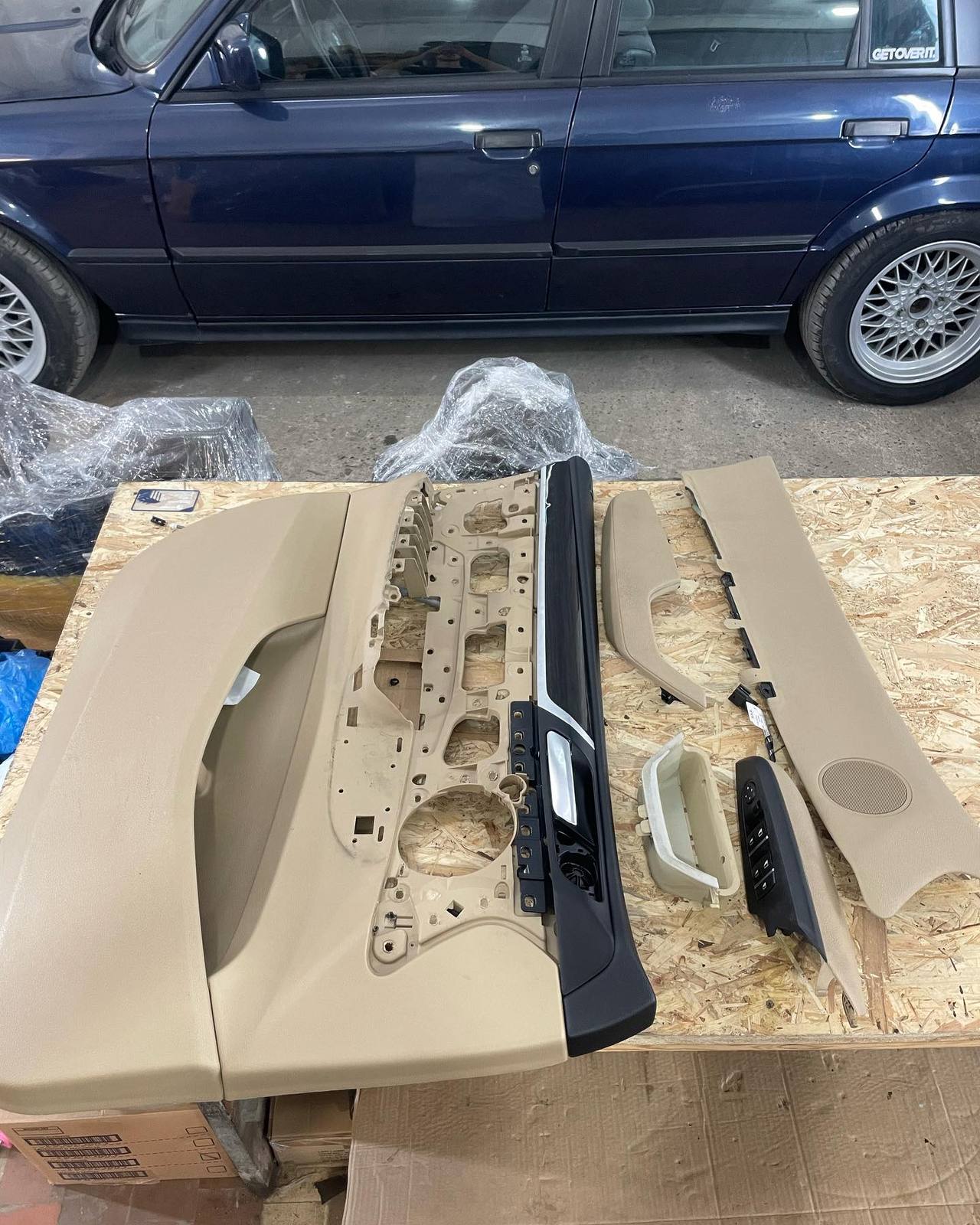 The door cards dismantled on the workbench