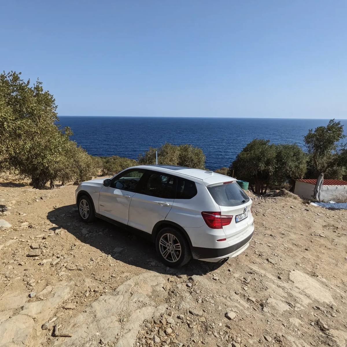 The X3 on a sloping stone track above the sea, in Thassos