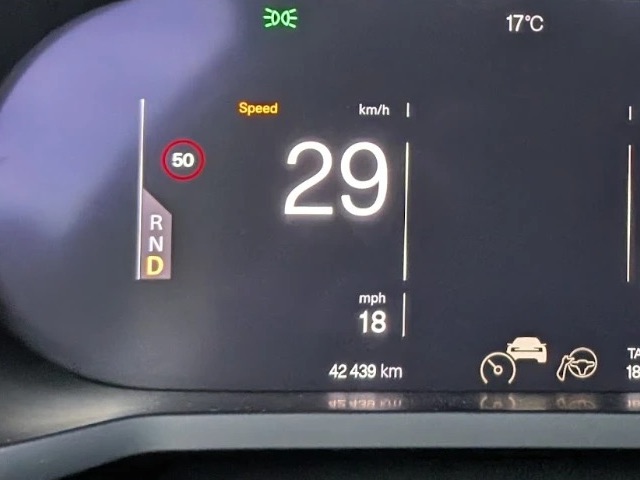 The R N D selector on the driver display, with its top-left corner cut on a diagonal